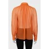 Напівпрозора блузка оранжевого кольору