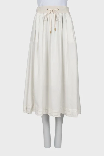 Белая юбка А-силуэта