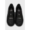 Черные кроссовки из кожи и замши
