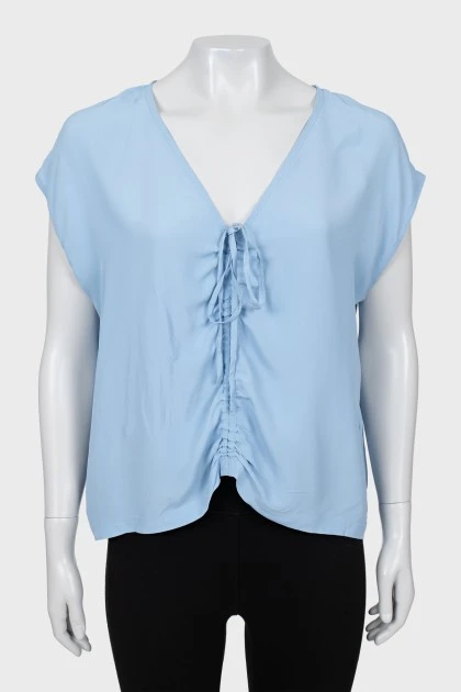 Голубая блуза с завязками