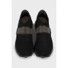 Черные кроссовки из текстиля и кожи
