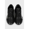 Черные кроссовки из кожи