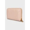 Рожевий шкіряний гаманець з биркою