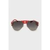 Сонцезахисні окуляри з червоними дужками