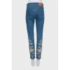 Джинси slim fit із золотистою вишивкою