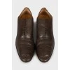 Чоловічі коричневі туфлі з перфорацією