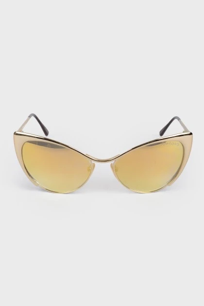 Сонцезахисні окуляри золотистого кольору