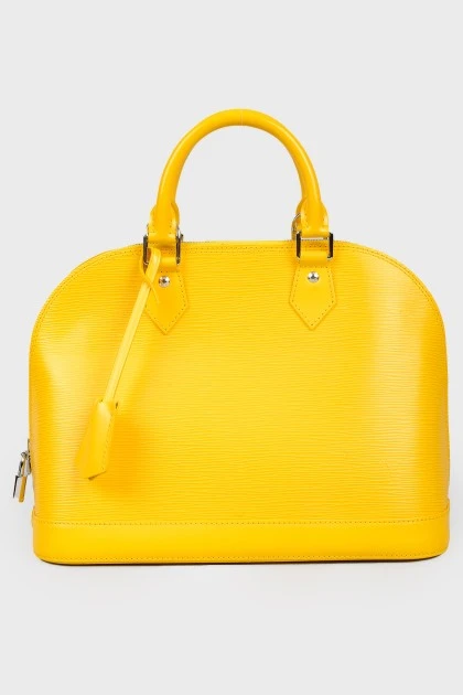 Яскраво-жовта текстурована сумка