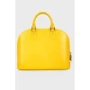 Яскраво-жовта текстурована сумка