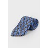 Блакитна краватка з принтом