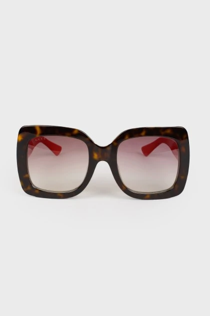 Сонцезахисні окуляри з червоними дужками