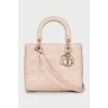 Розовая сумка Lady Dior