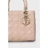 Розовая сумка Lady Dior