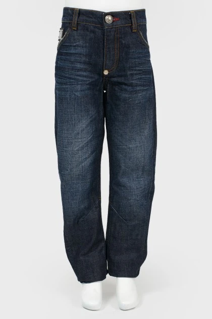 Широкі джинси з вишивкою на кишенях