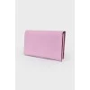 Рожевий шкіряний гаманець на магнітній застібці