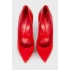 Червоні туфлі на тонкій шпильці