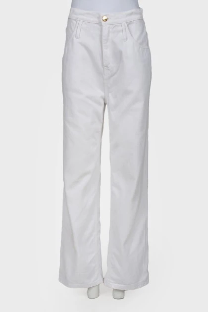 Білі джинси вільного крою