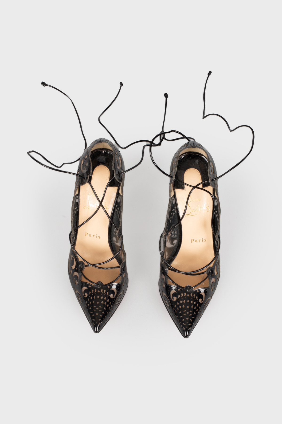

Туфли с вырезным узором на завязках Christian Louboutin