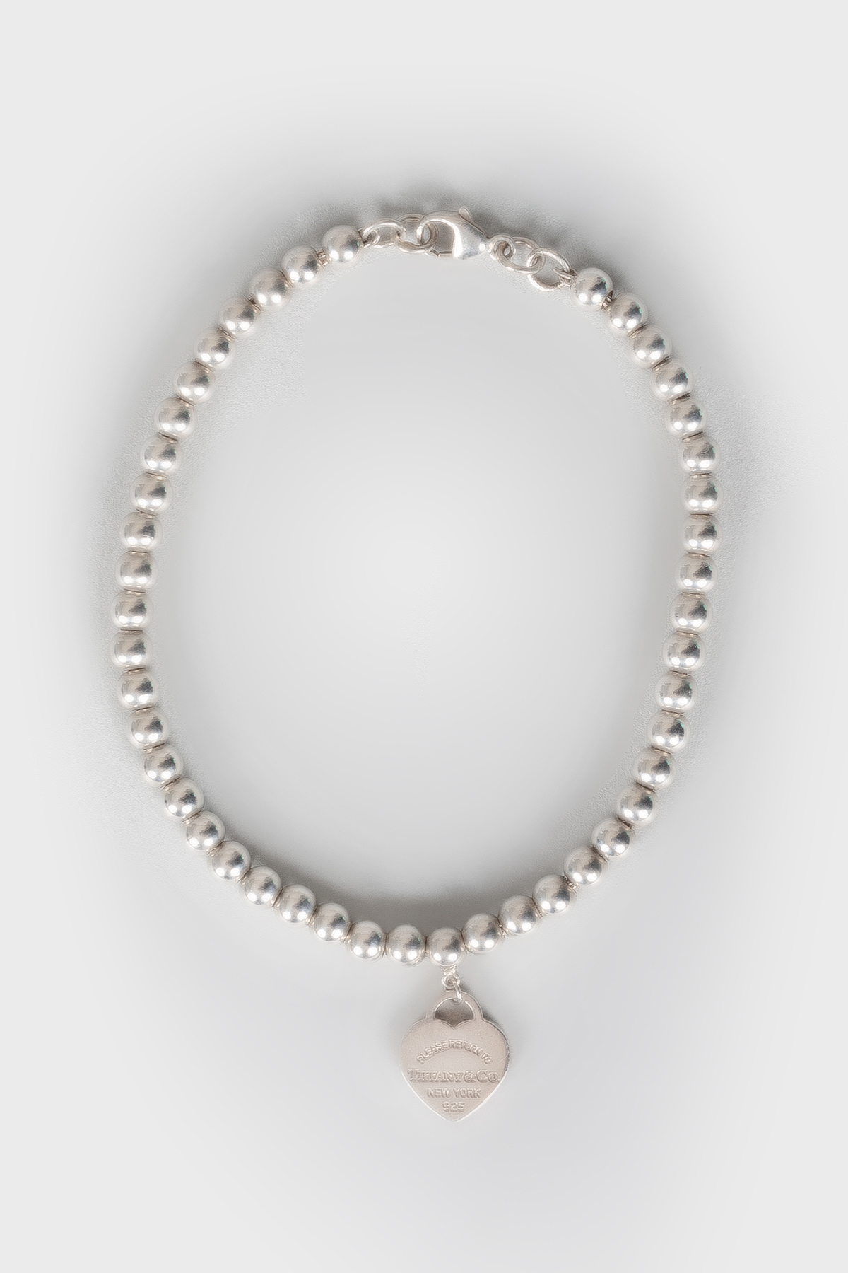 

Серебряный браслет с сердечком Tiffany & Co, Серебристый